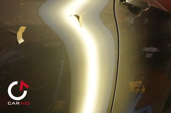 BMW３シリーズのリアドアにできてしまったヘコミをデントリペアで修理した後の画像
